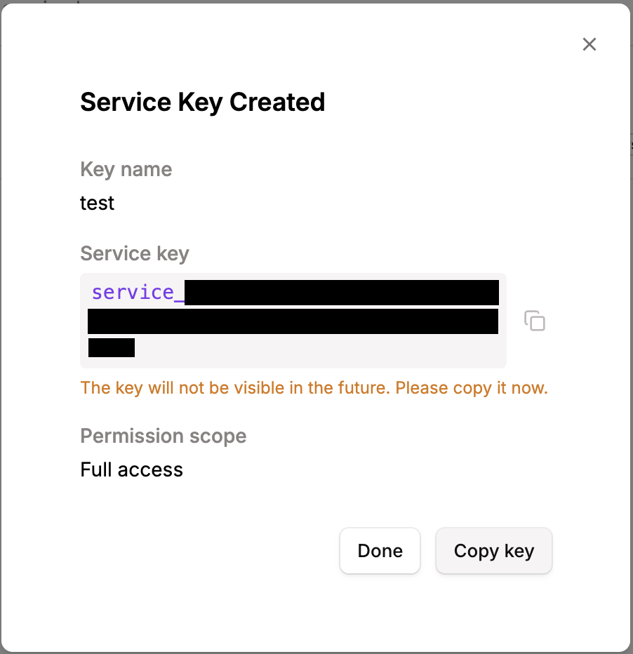 Service Key Created modal showing the one-time secret value with a Copy key button